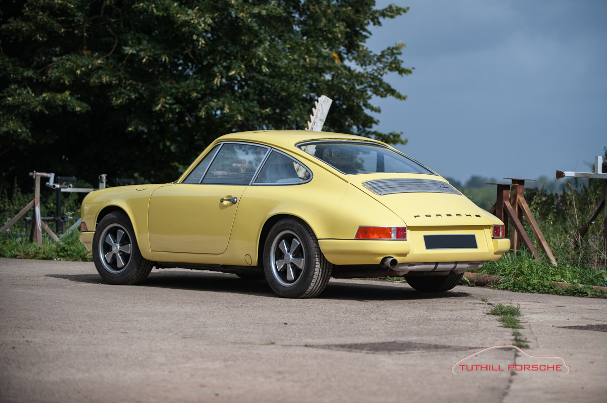 Light Yellow 911 road car in the Tuthill Porsche workshop