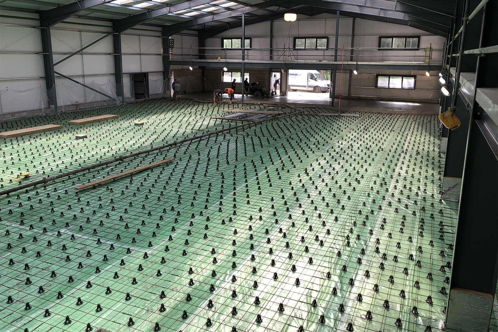 Building Update: Floor is poured in the new Tuthill workshop